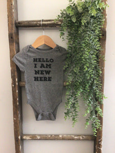 I am new here onesie