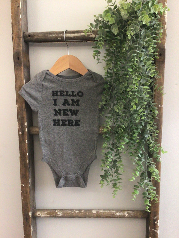I am new here onesie