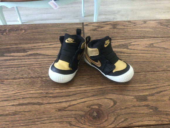 Gold Nike Jordan’s
